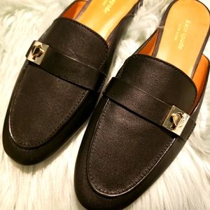 Kate Spade leather black slide loafers.